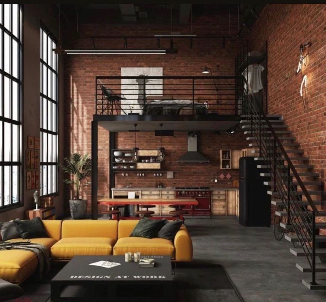 Loft-style living area with high ceilings and exposed brickwork