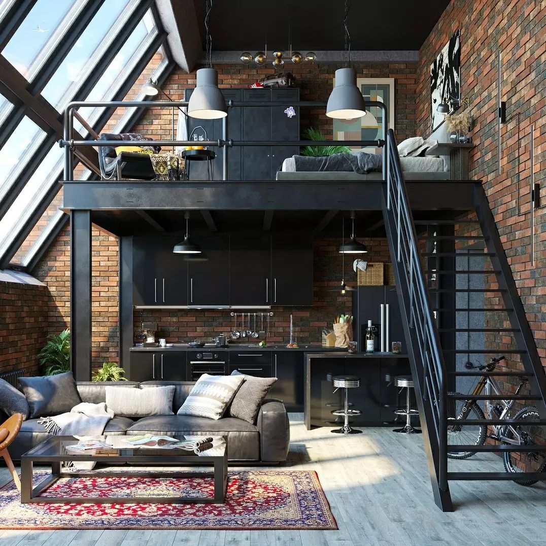 Loft apartment interior with exposed brickwork and mezzanine bedroom