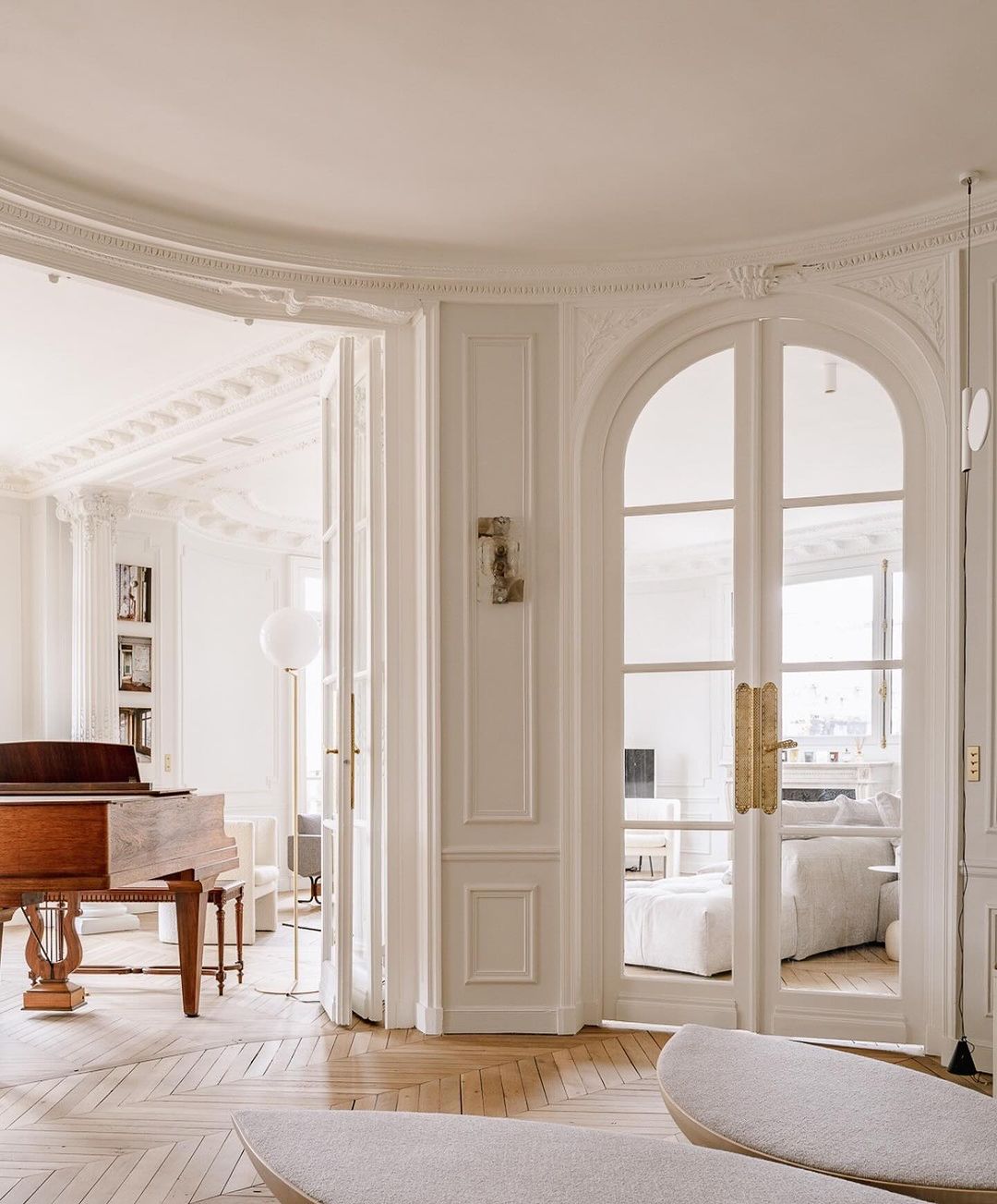 Classic Parisian apartment with high ceilings and herringbone flooring