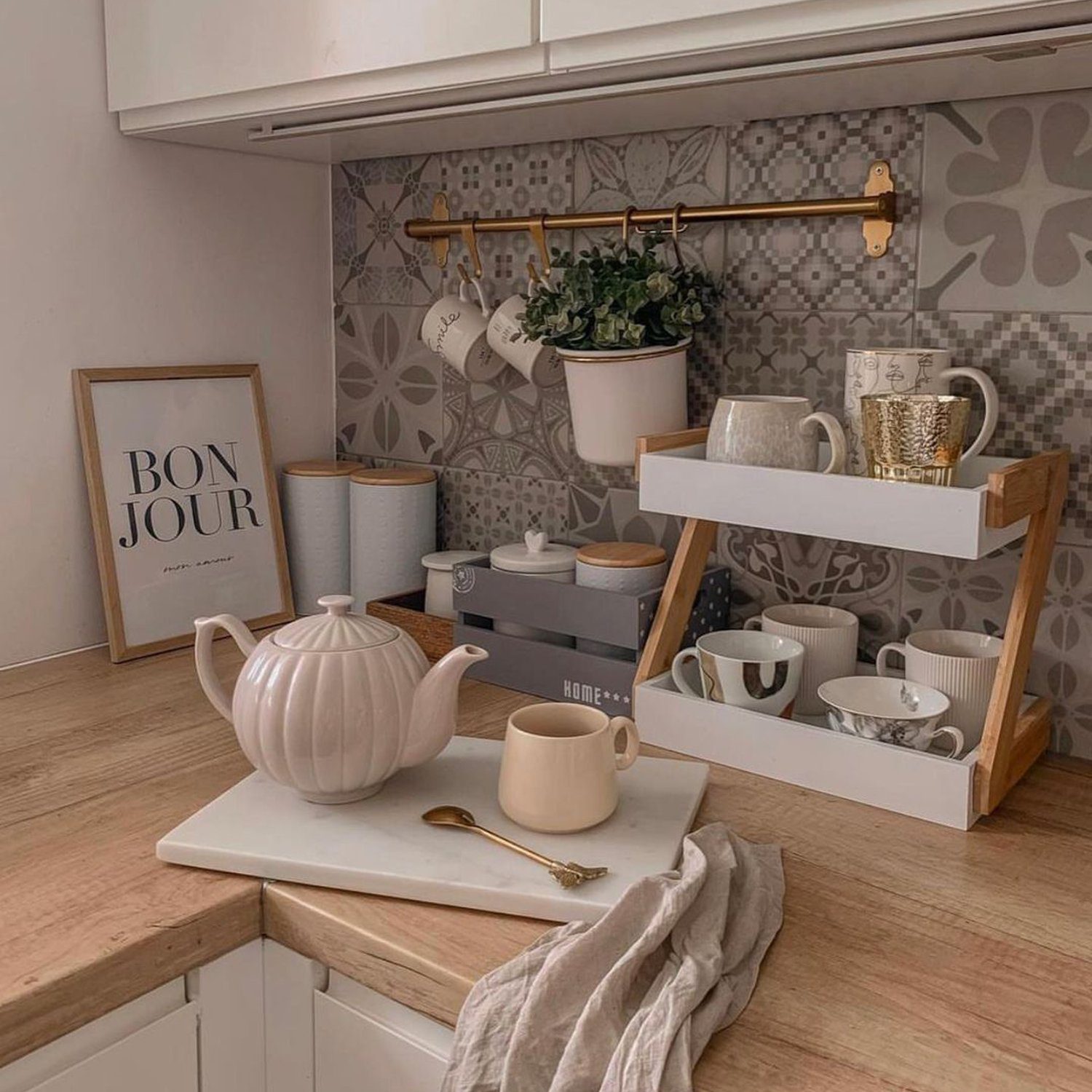 A neatly organized kitchen corner with a Scandinavian aesthetic