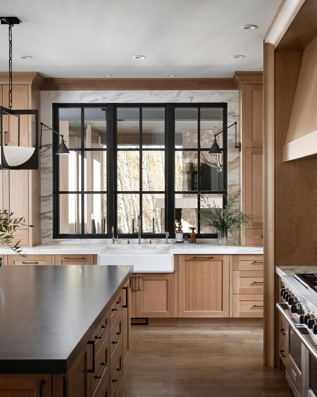 A harmonious blend of natural light and modern design elements in a kitchen space