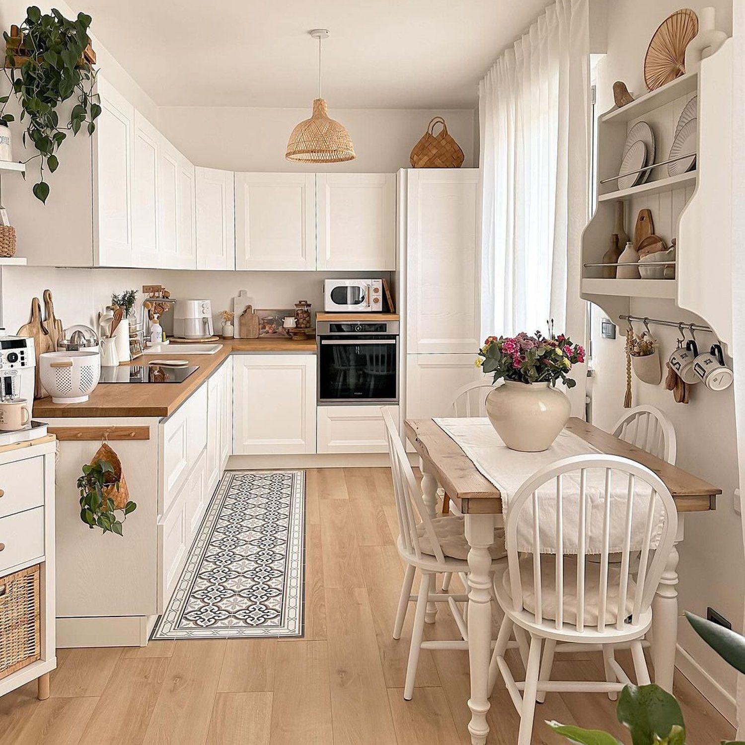 A warm and inviting kitchen design showcasing natural light and cozy aesthetics