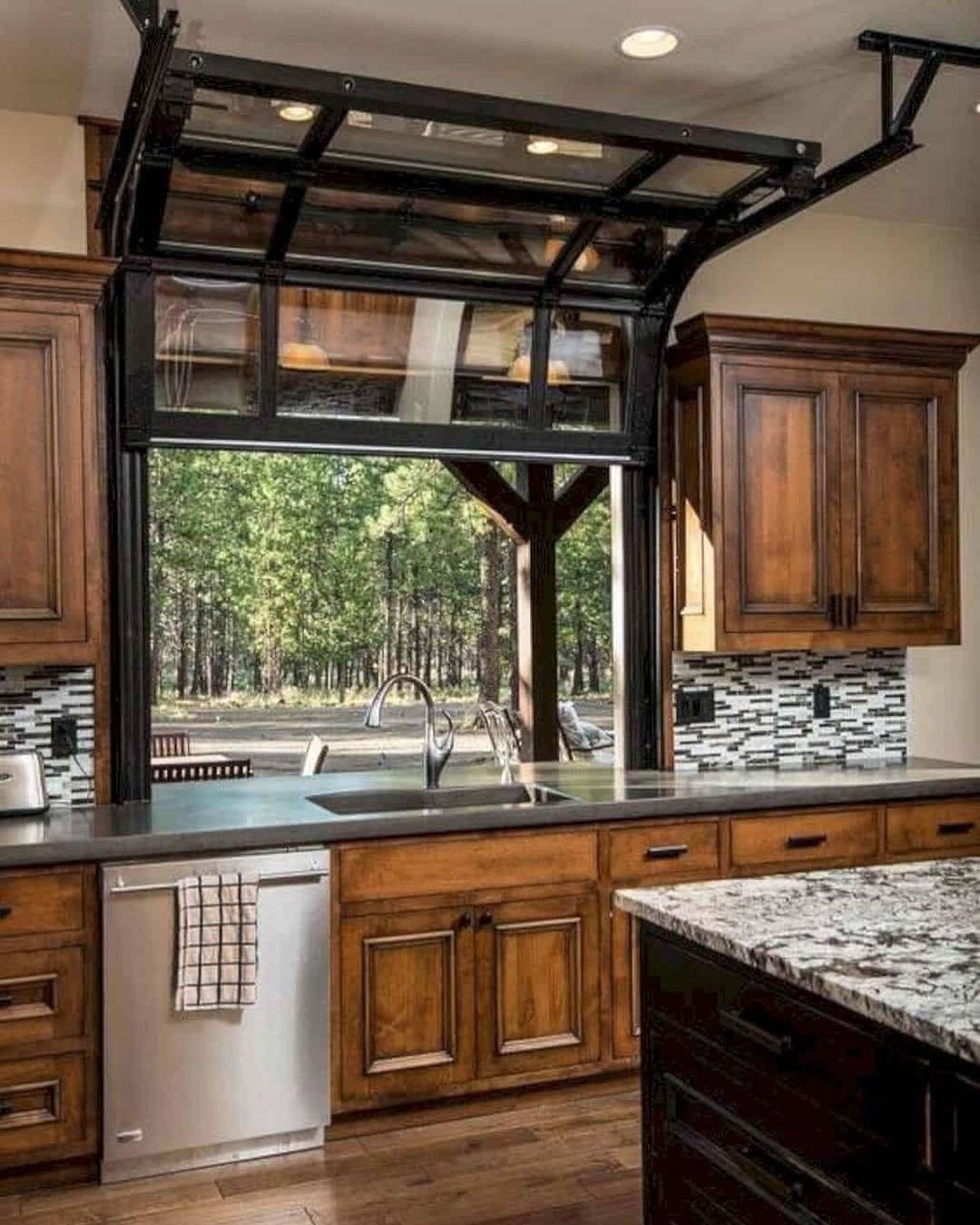 A unique kitchen design featuring a retractable window garage door