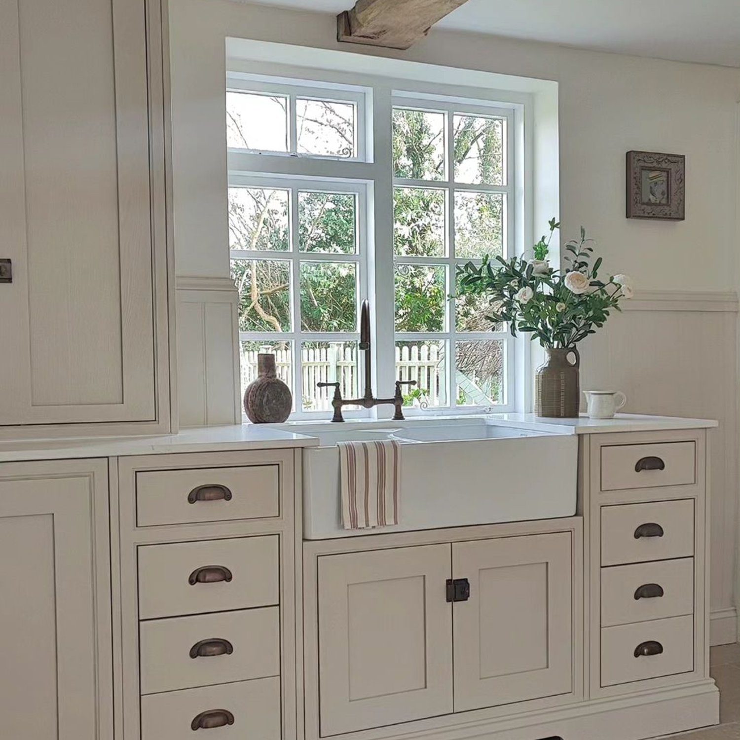 Traditional styled kitchen with exposed wooden beams