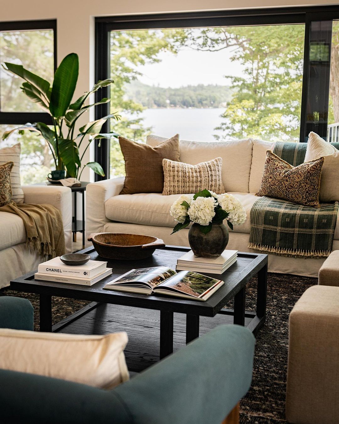 Cozy lakeside living room with a serene view