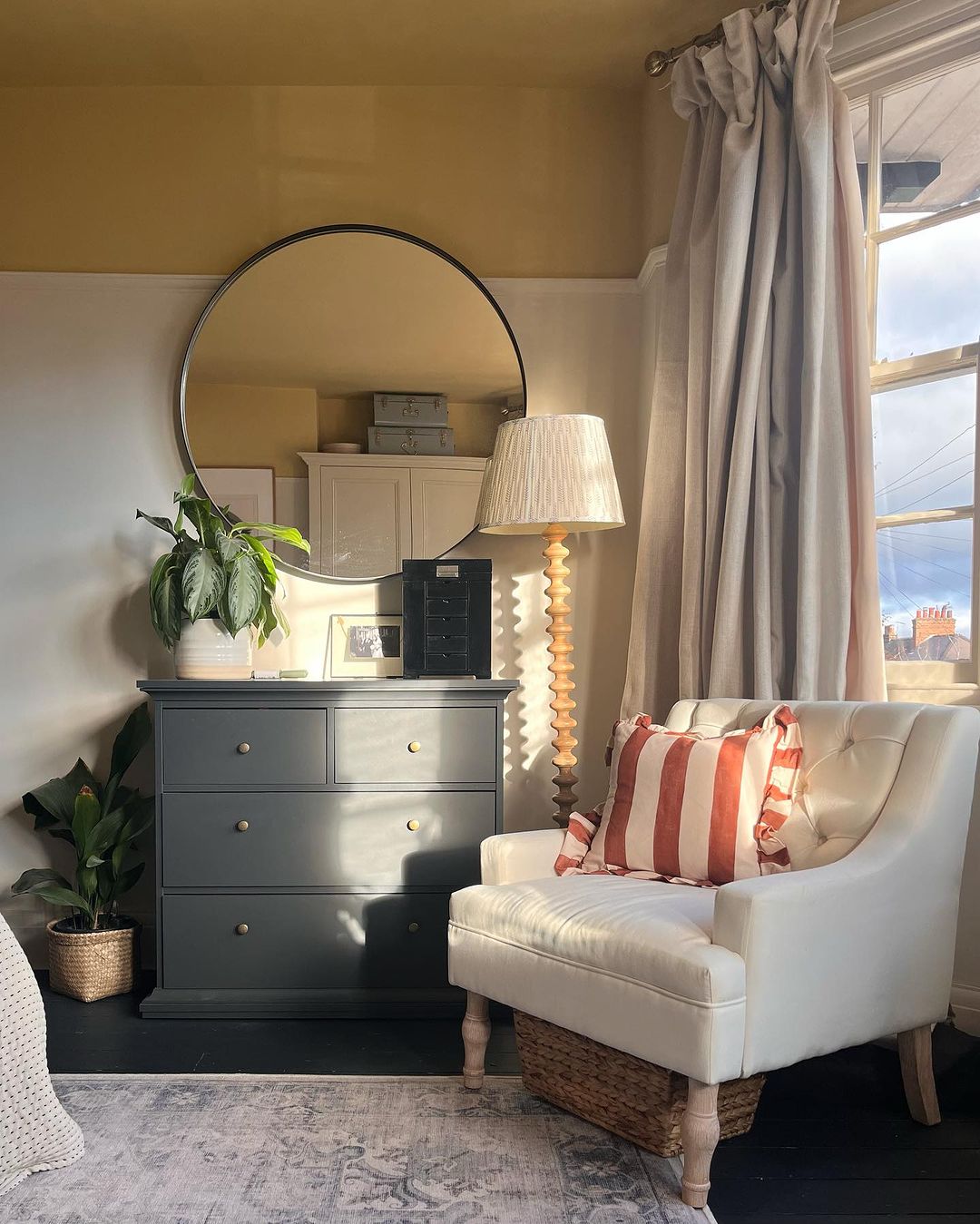 A cozy and stylishly decorated living room corner