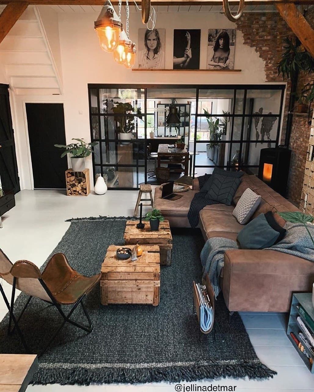 Loft-style living room with exposed brick and beams