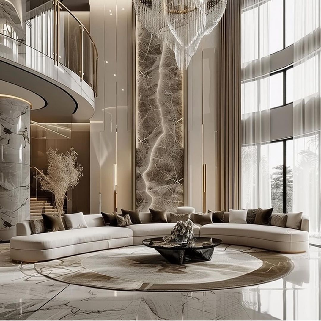 Luxurious modern living room with a large curved sofa and a stunning chandelier