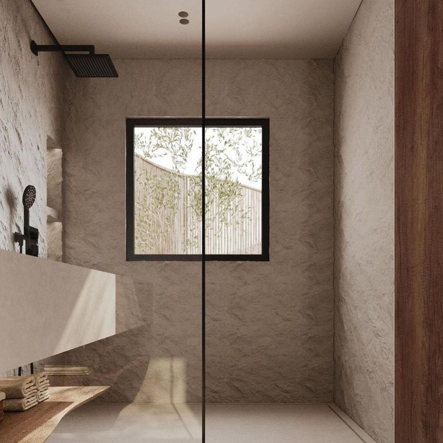 Minimalist bathroom with textural walls and a sleek design