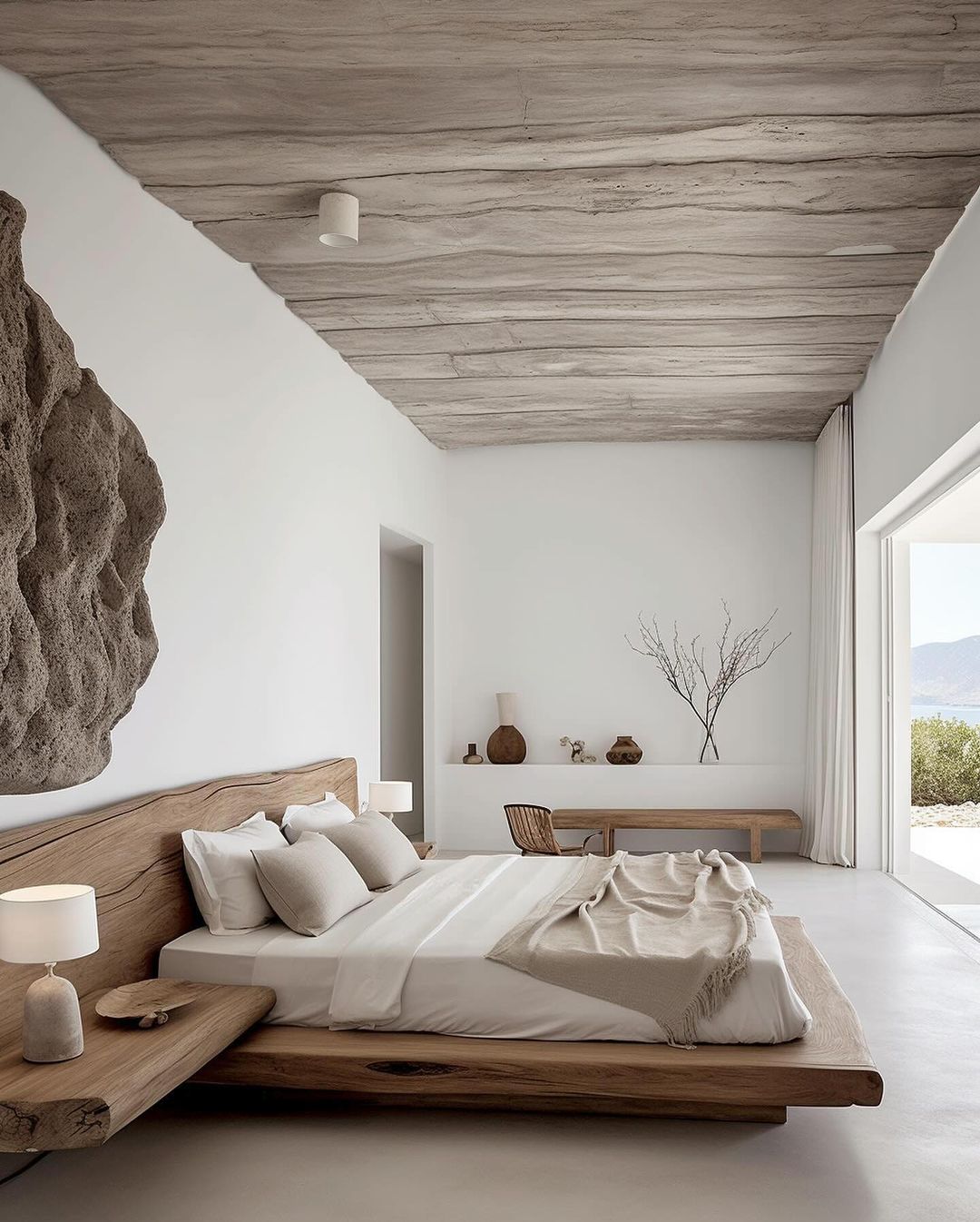 A minimalist bedroom with a raw edge wooden bed