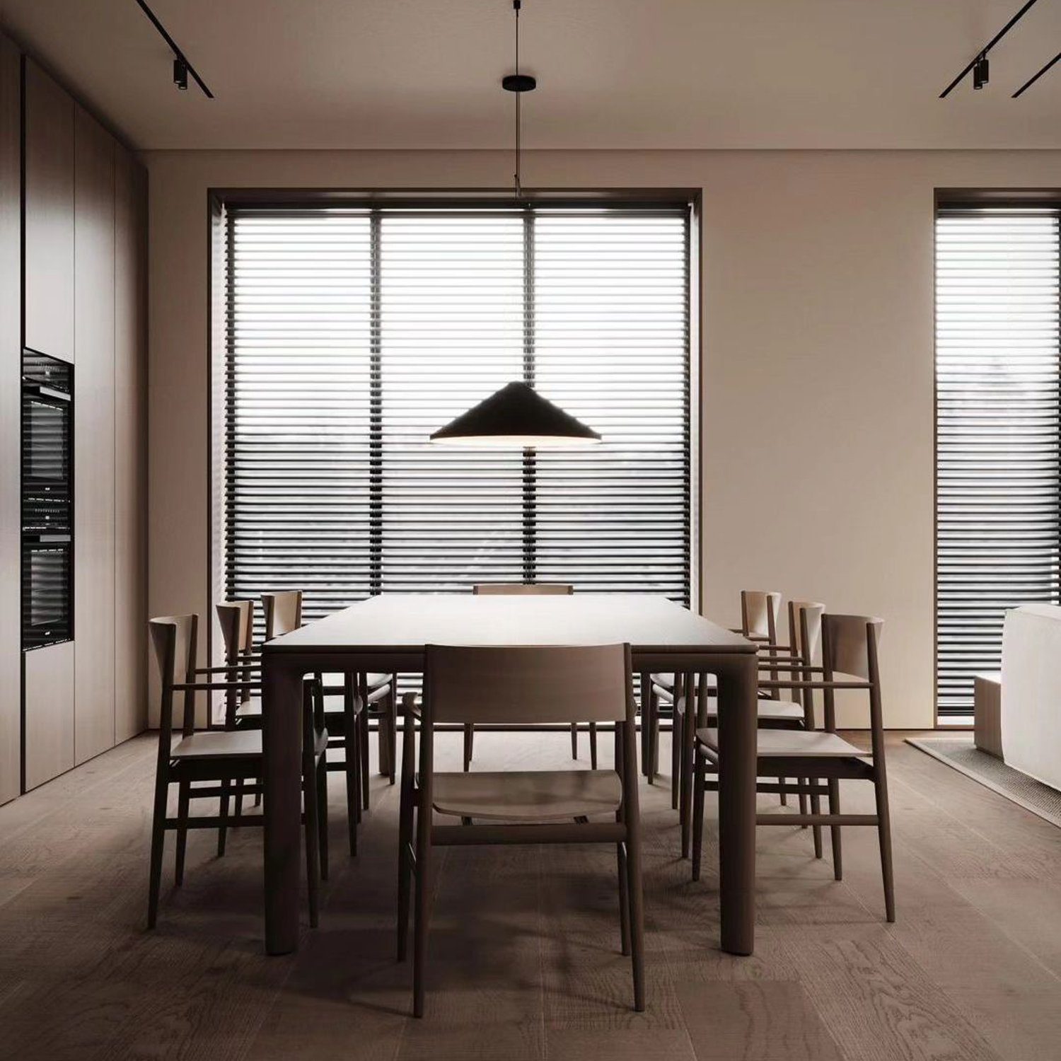 Elegant, minimalist dining room design with focus on material harmony