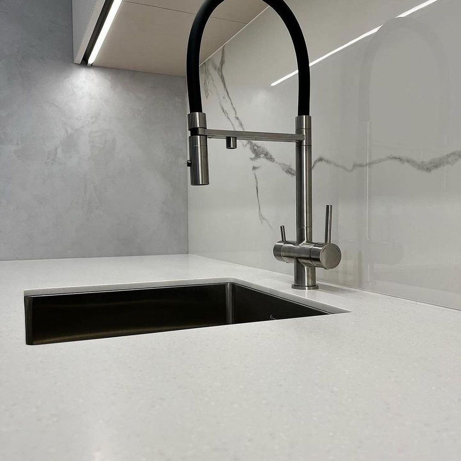 Minimalist kitchen design with a sleek under-mount sink