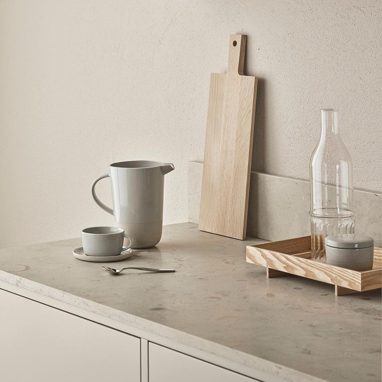 A minimalist kitchen corner featuring a sleek design