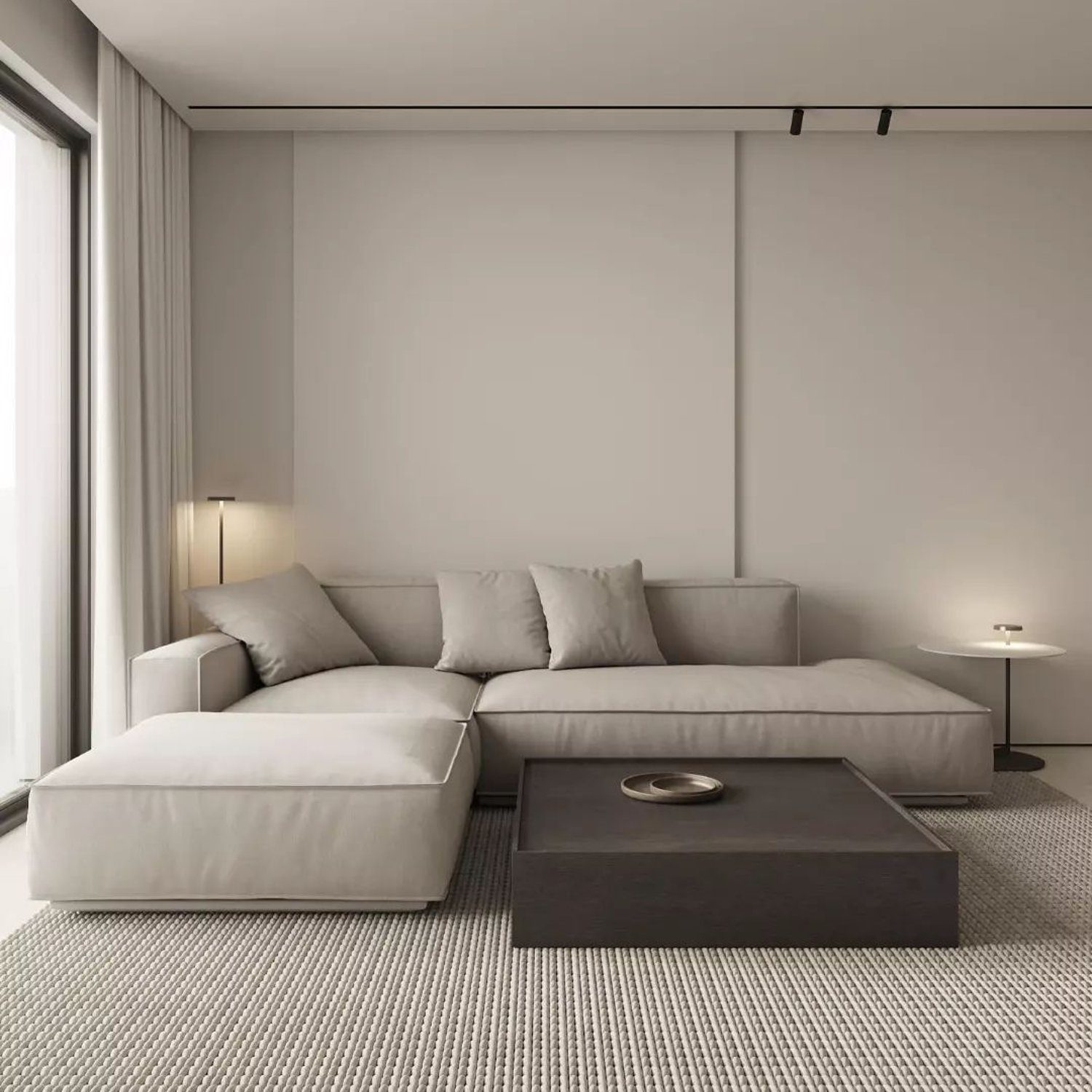 Minimalist living room with a large, modular light grey sofa