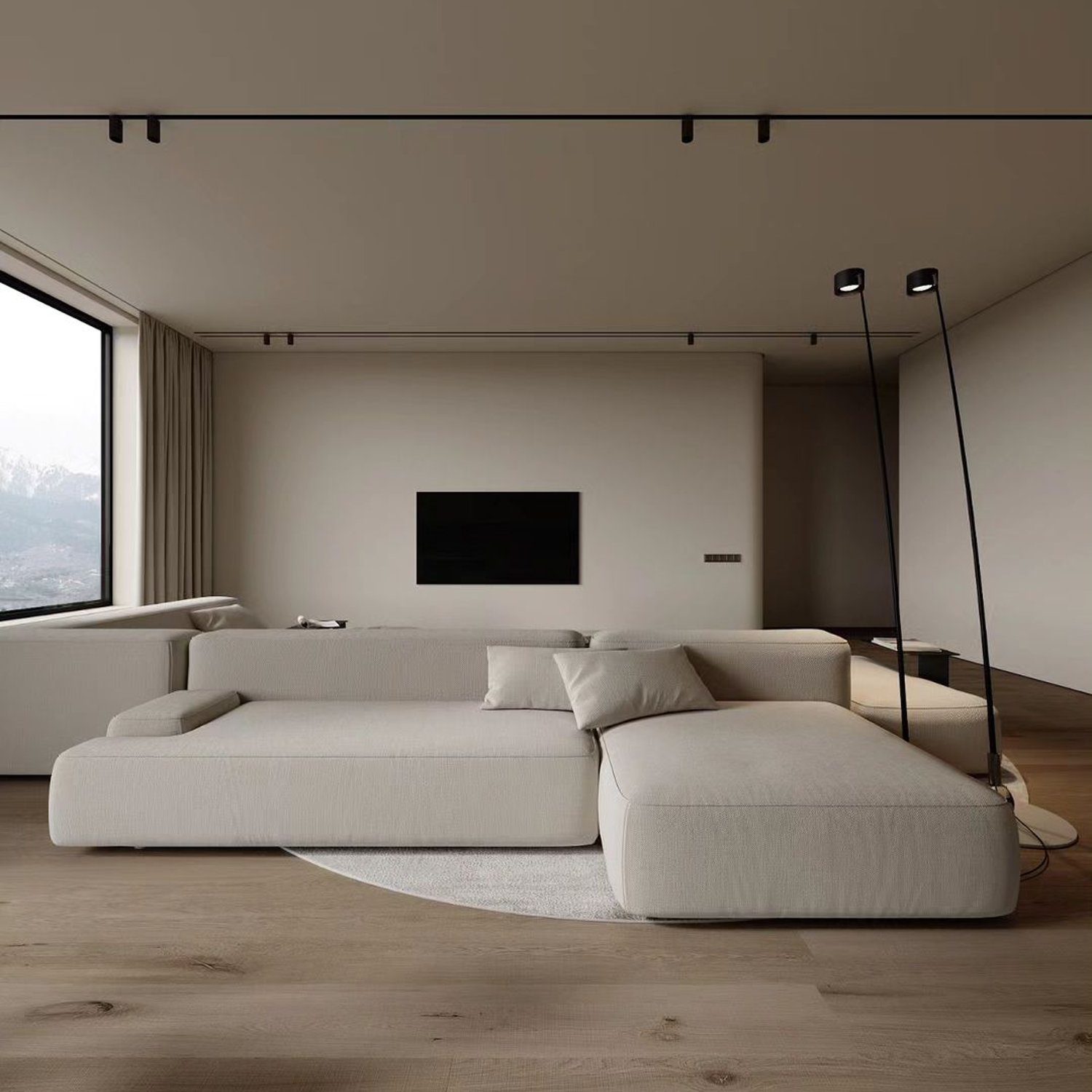 A modern and minimalist living room with vast mountain views