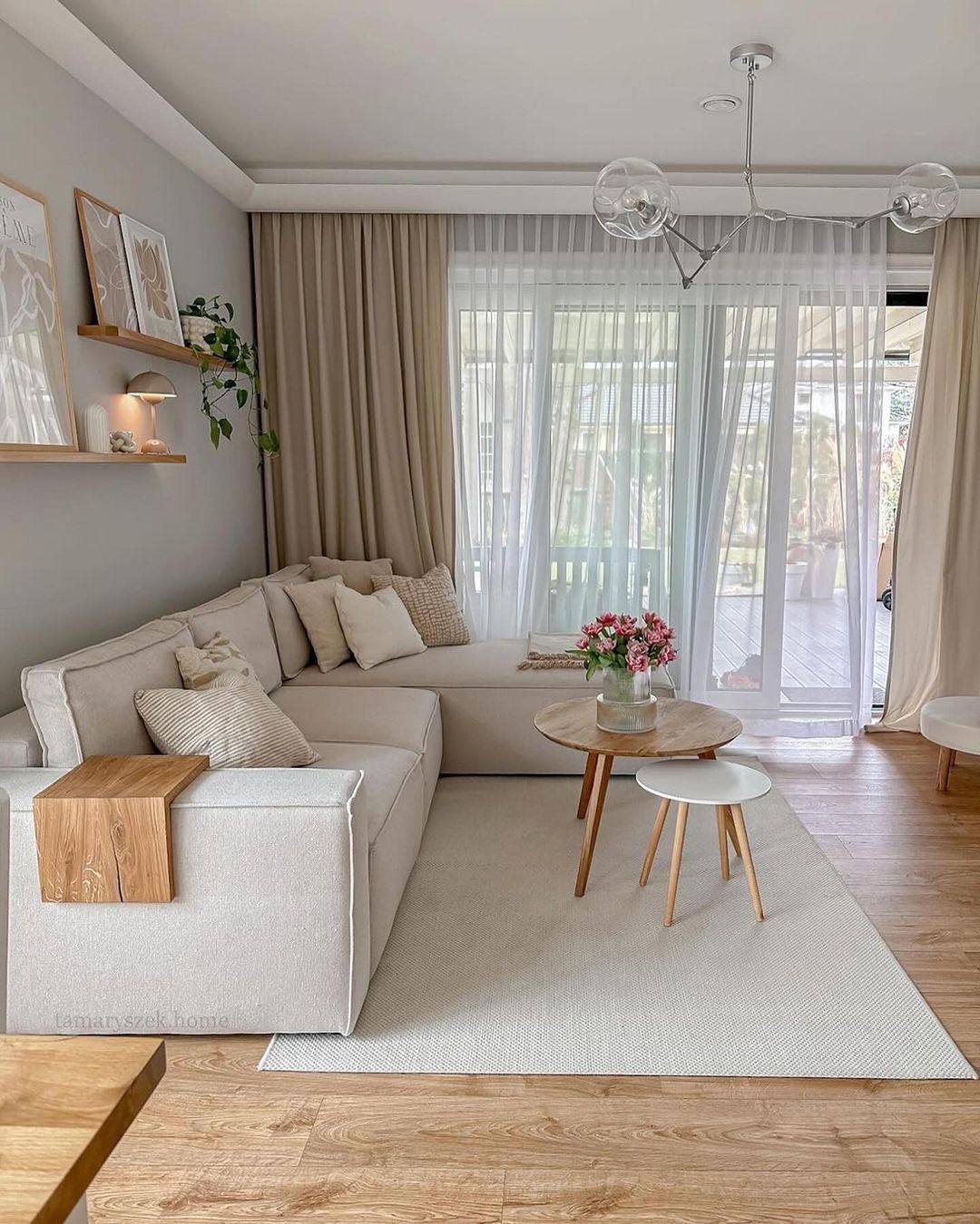 A well-organized living space with modern furnishings and ample natural light