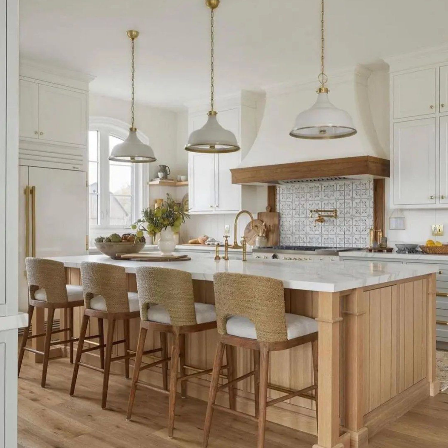 Elegant white kitchen with natural wood accents