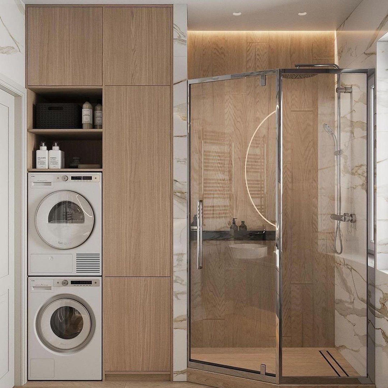 Elegantly designed utility space featuring integrated appliances and a glass-enclosed shower