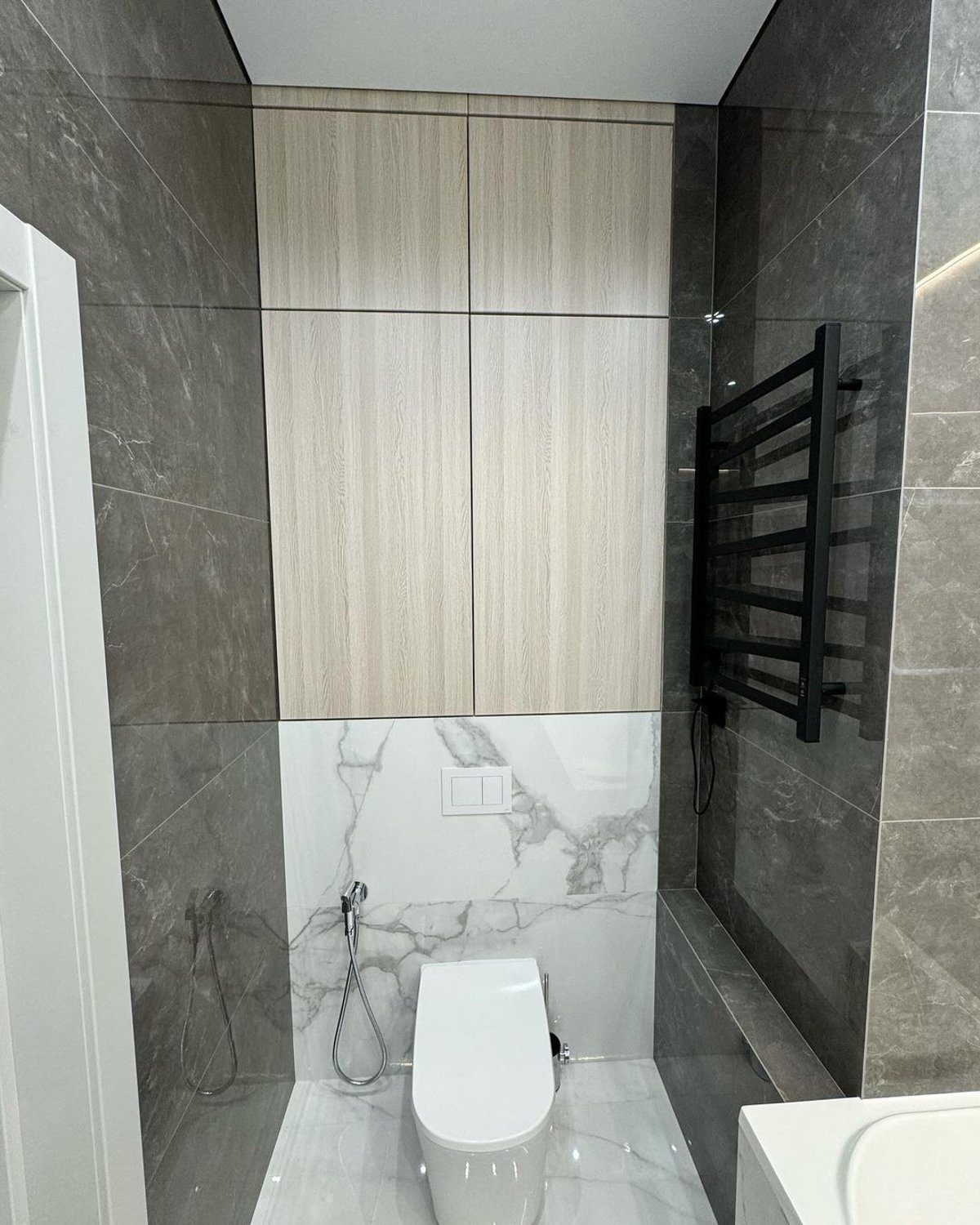 A modern bathroom with sophisticated finishes