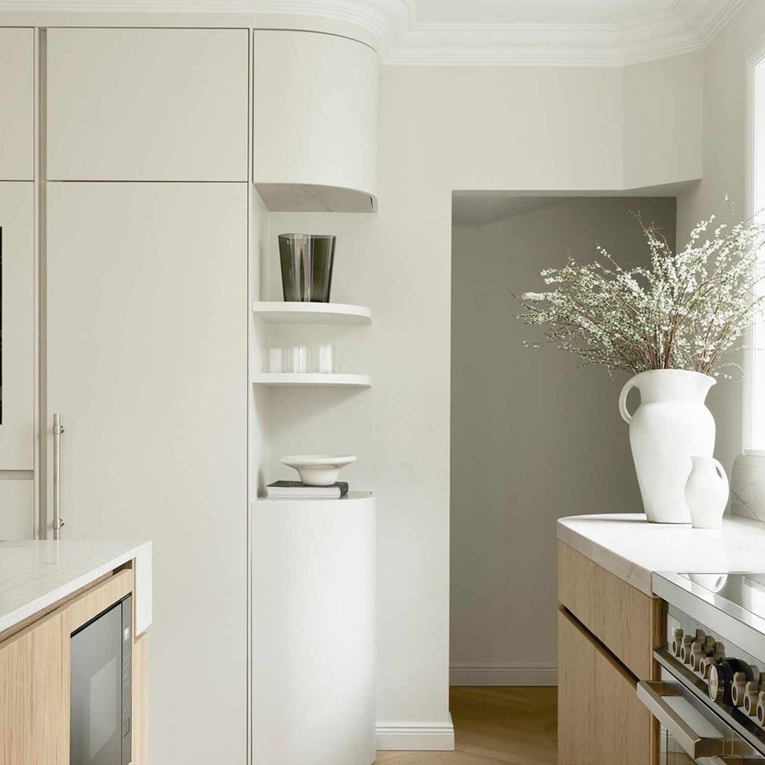 Modern minimalist kitchen with herringbone parquet