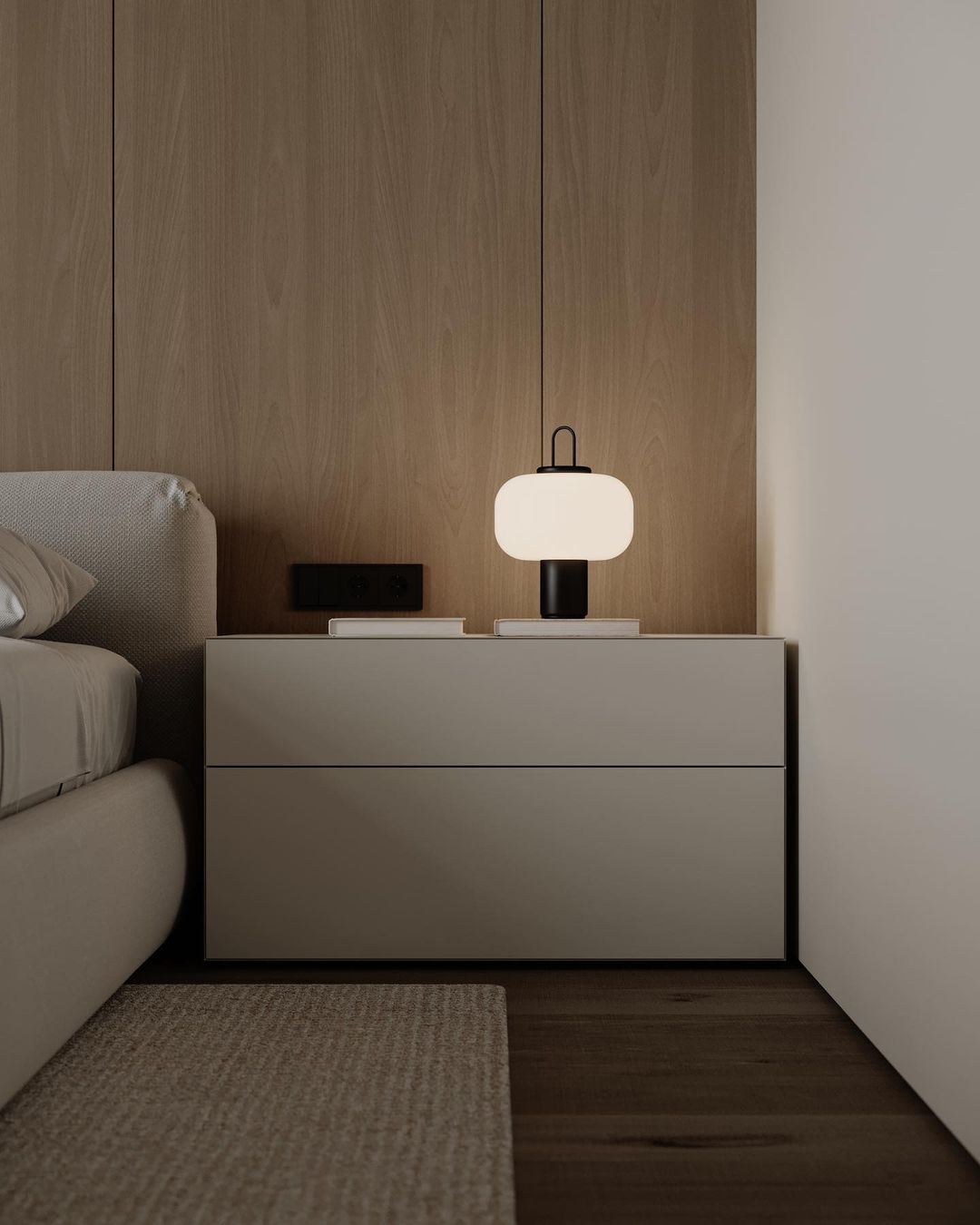 Minimalist bedroom with a bedside table and lamp