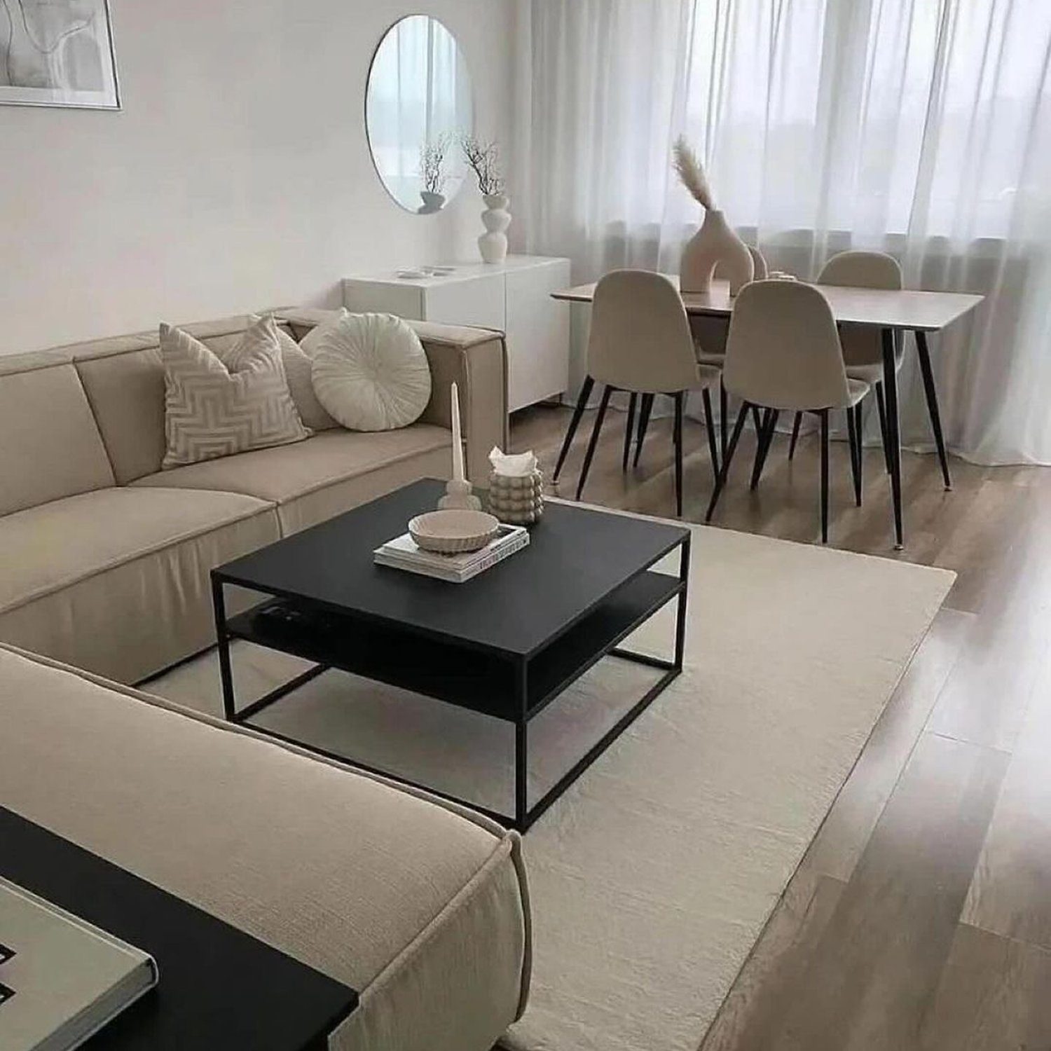 A tastefully designed living room with neutral tones.