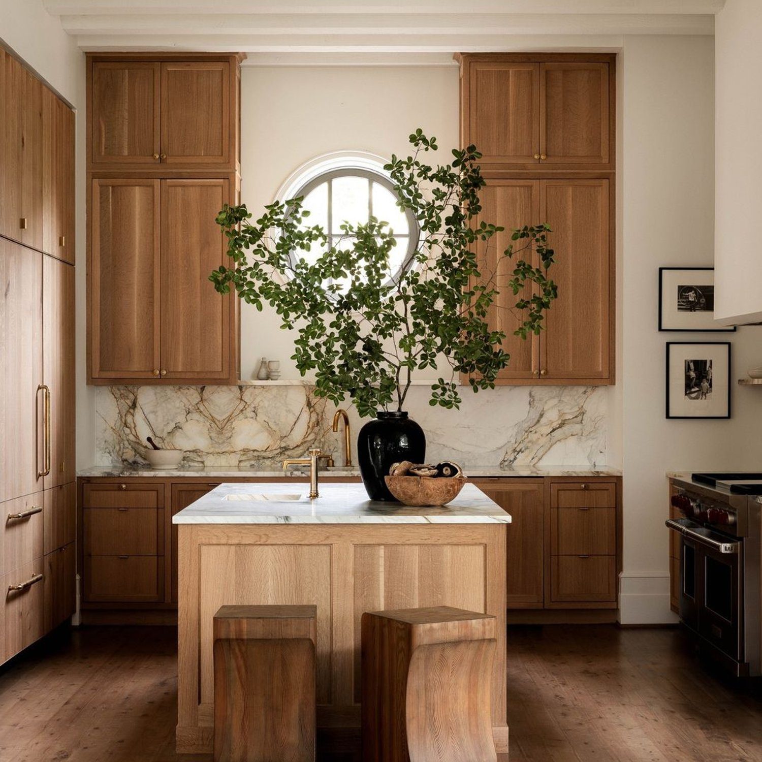 Elegant wooden kitchen with marble accents