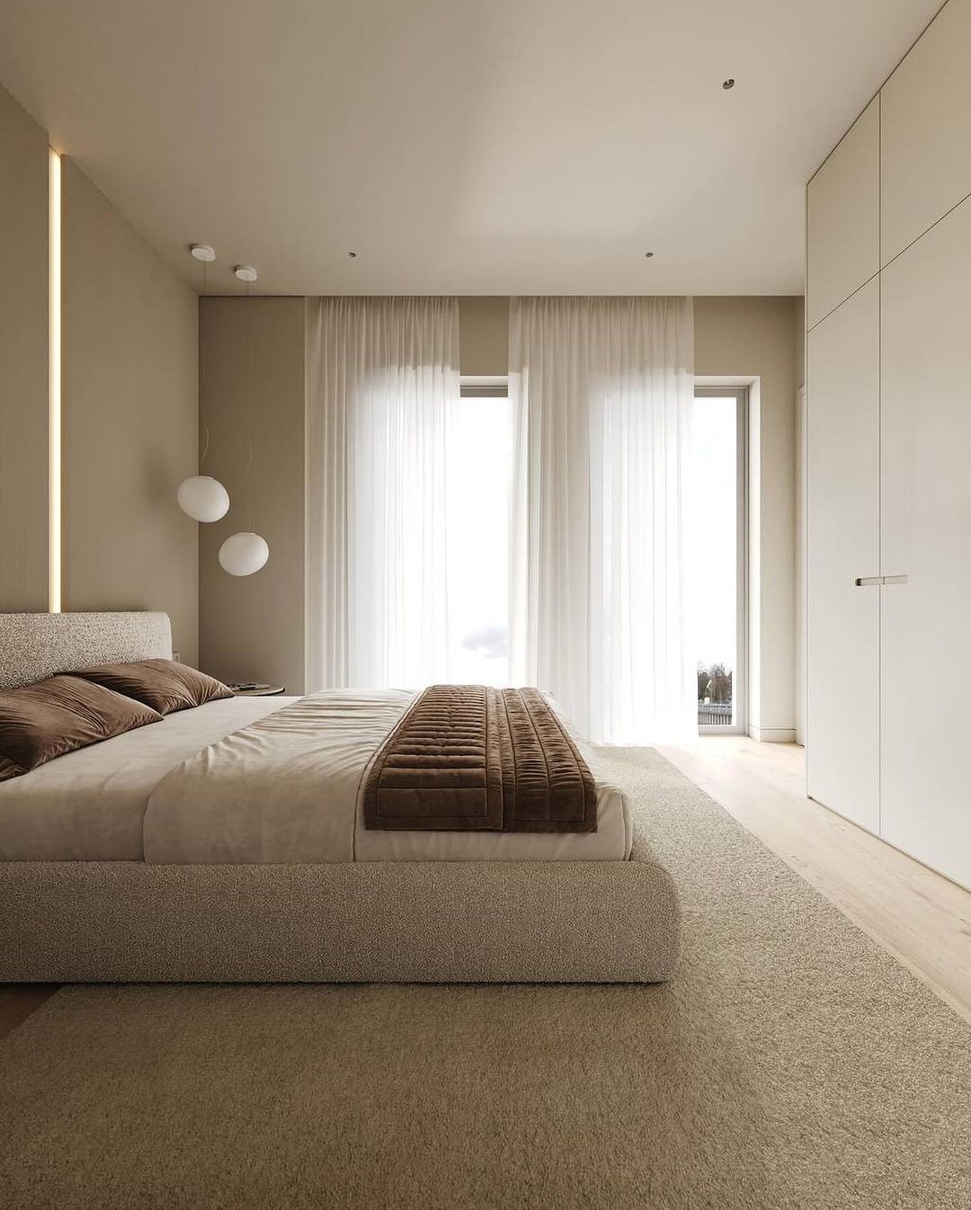 A minimalist bedroom design with harmonious neutral tones