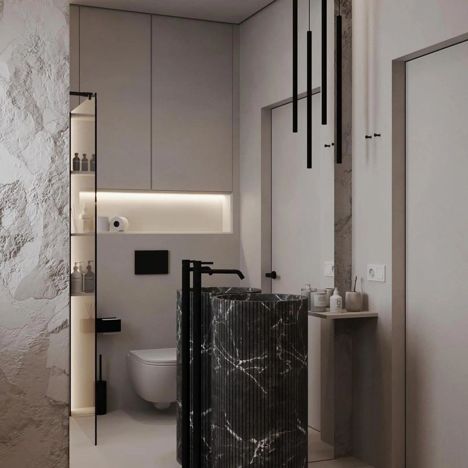 A minimalist bathroom featuring sleek dark fixtures and contrasting textures