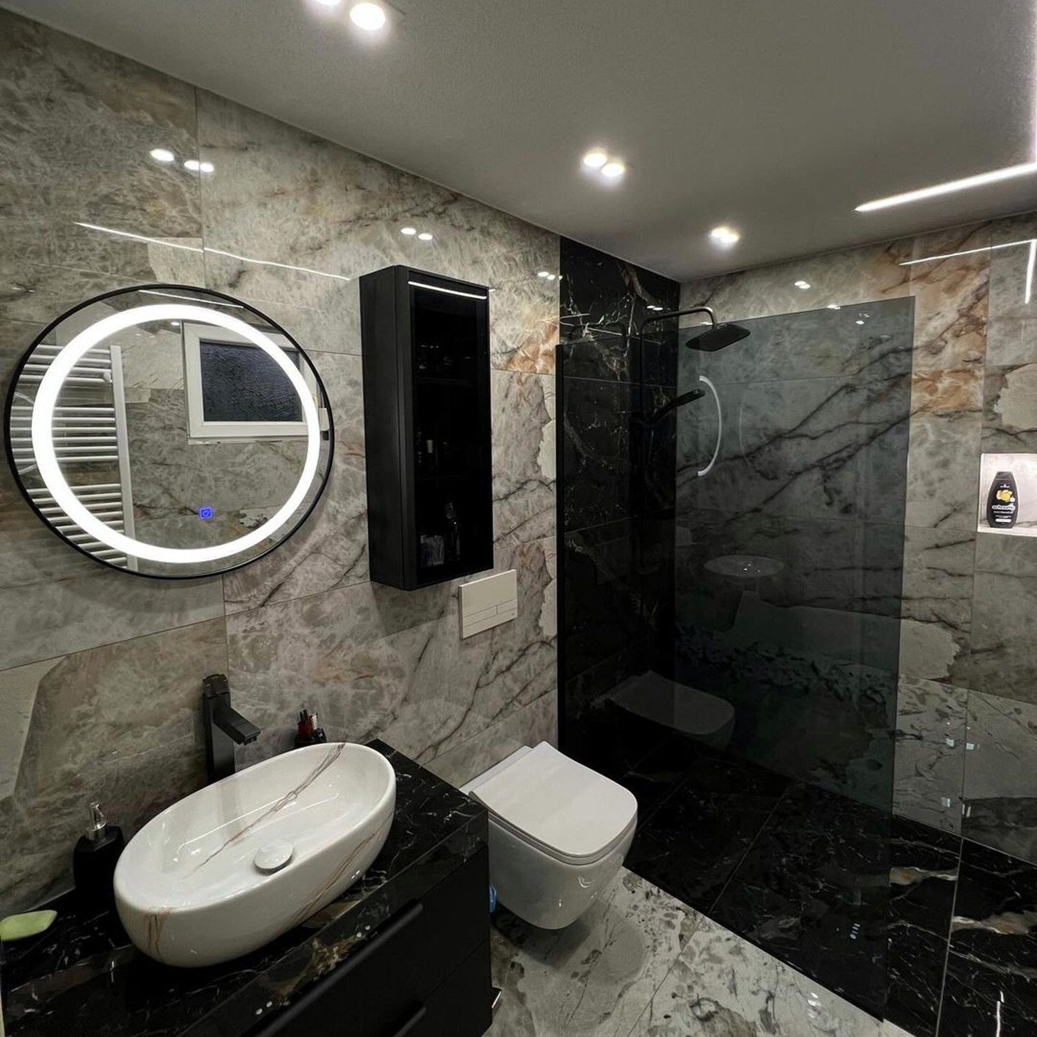 Elegantly designed modern bathroom with marble finish