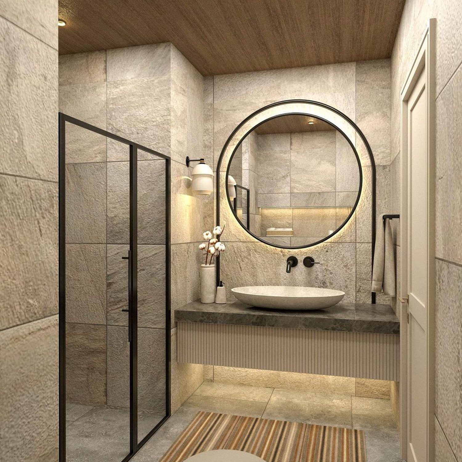 A modern and elegant bathroom design with neutral tones and a circular mirror.