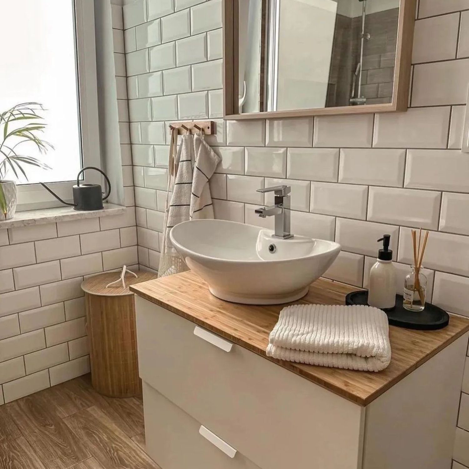 Modern minimalistic bathroom with wooden accents