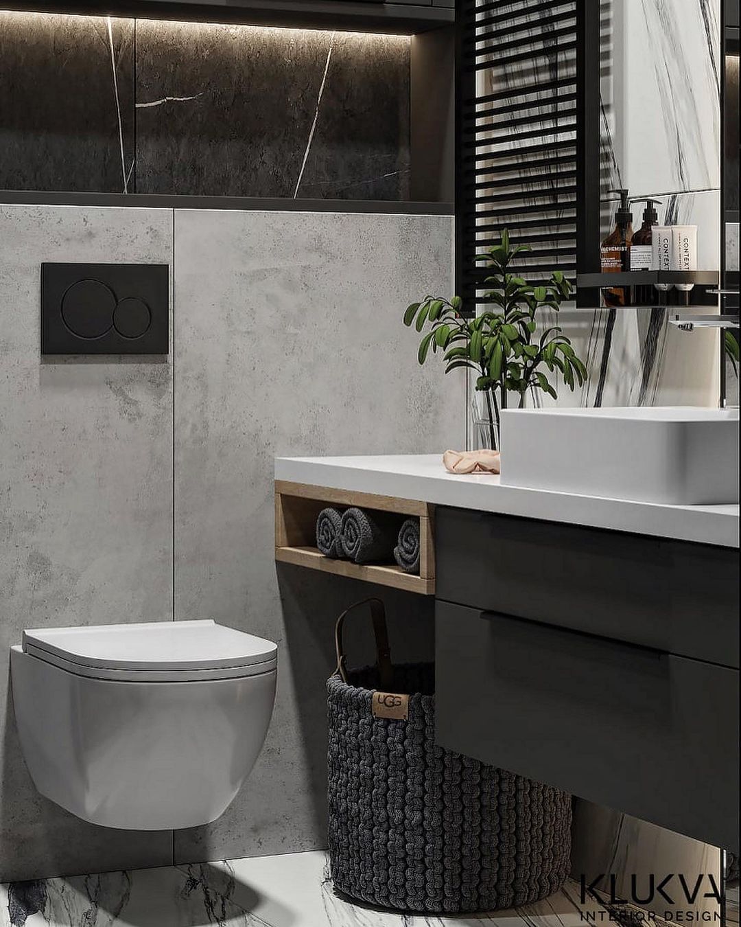 A modern bathroom featuring a sleek wall-mounted toilet, chic concrete walls contrasted with a dark marble backdrop, a minimalist white basin on a floating wood-and-metal vanity accompanied by a stylish woven basket for linens.