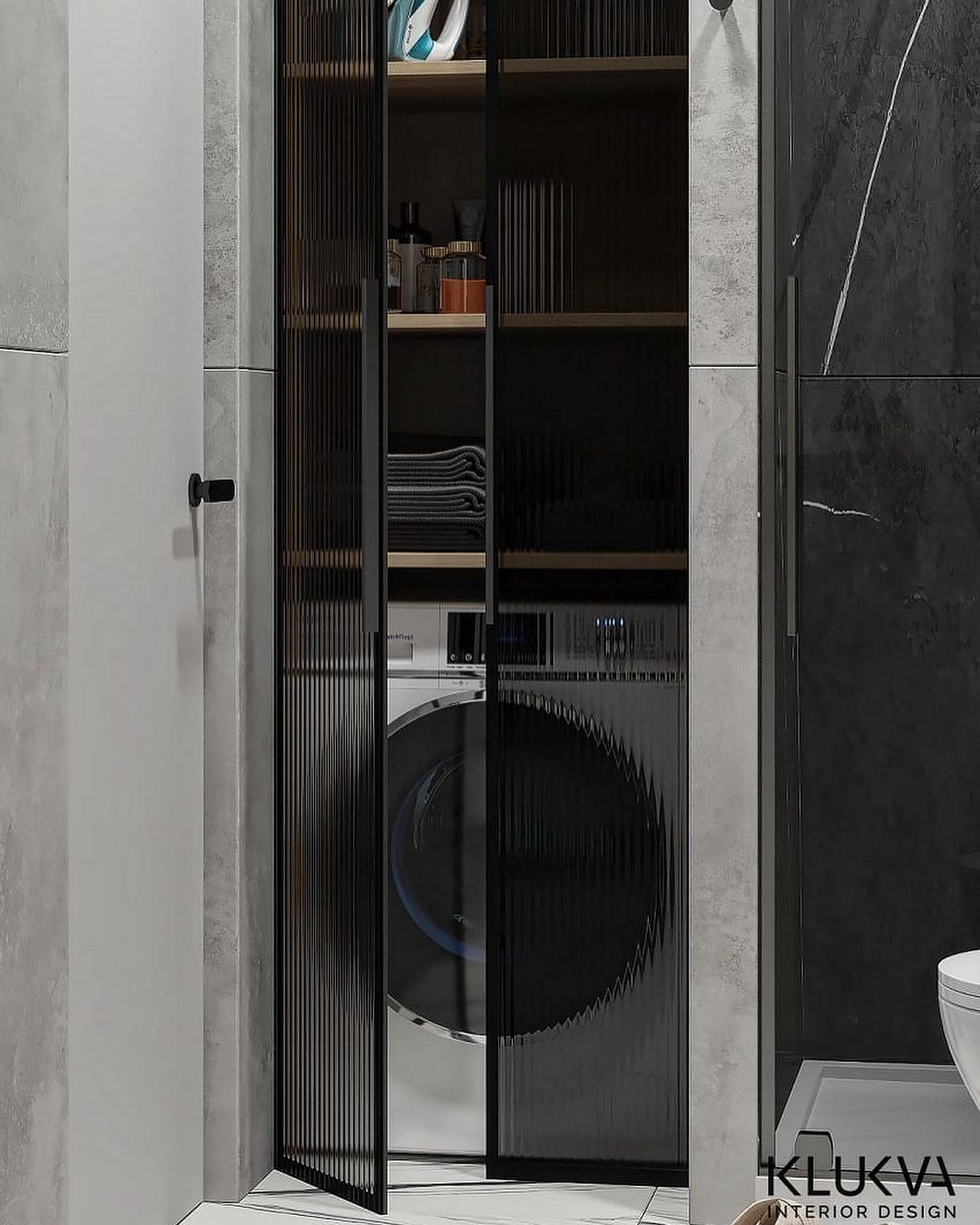 A sleek and functional bathroom design featuring a washing machine discreetly tucked behind ribbed glass doors and a neatly organized open shelving unit