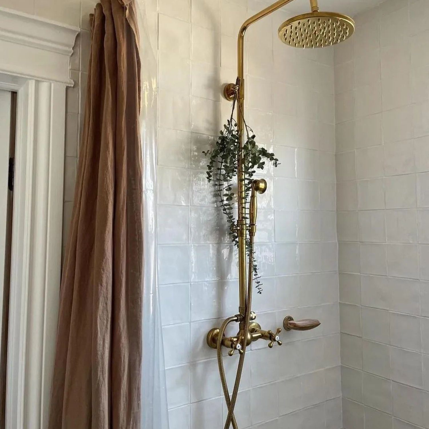 Elegant shower with gold fixtures