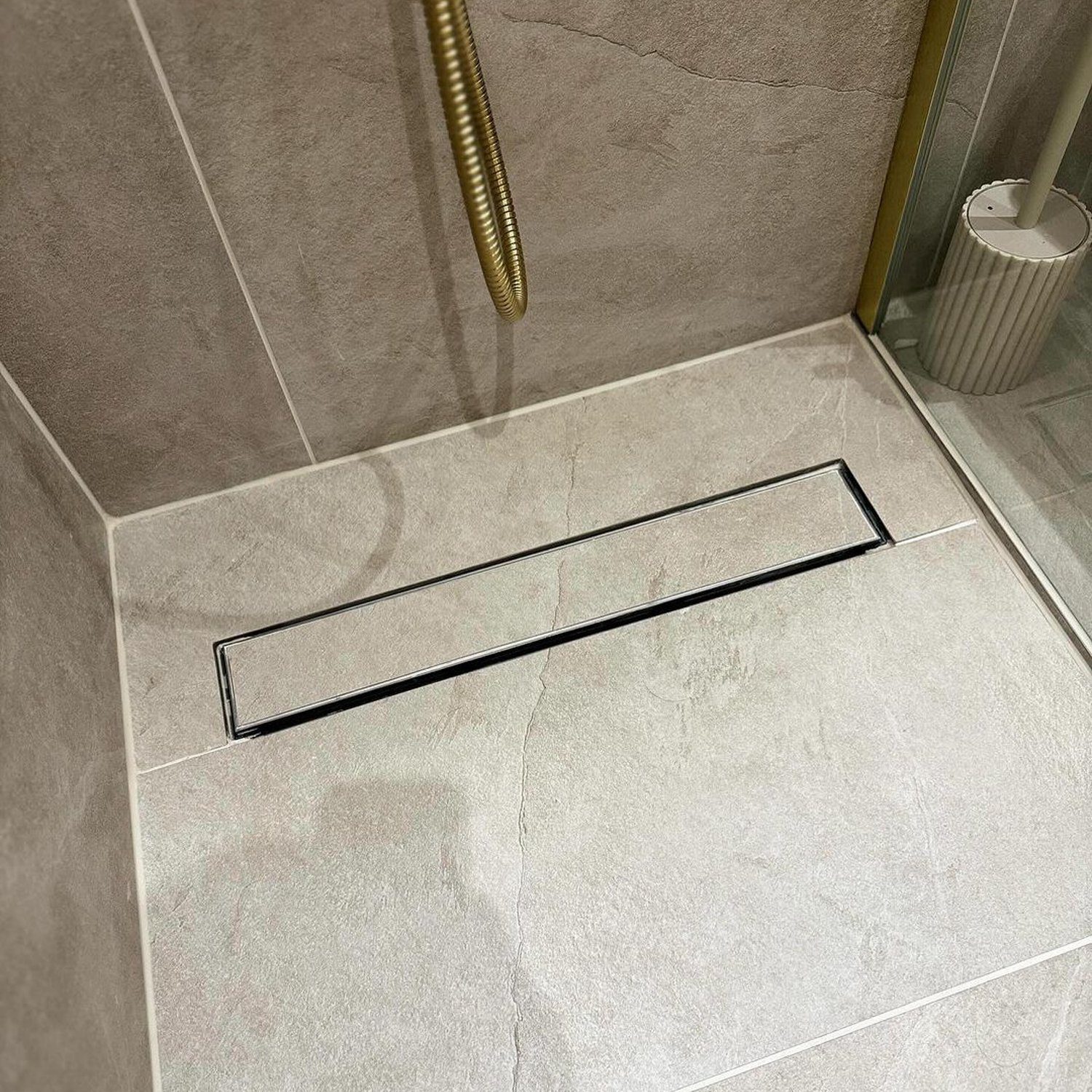 Linear shower drain in a modern bathroom