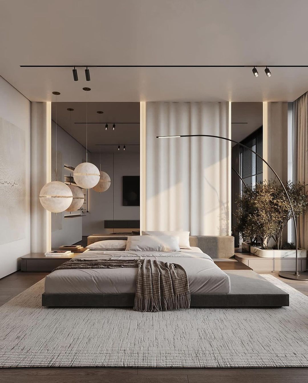 A modern bedroom design with a low-profile bed and oversized pendant lights