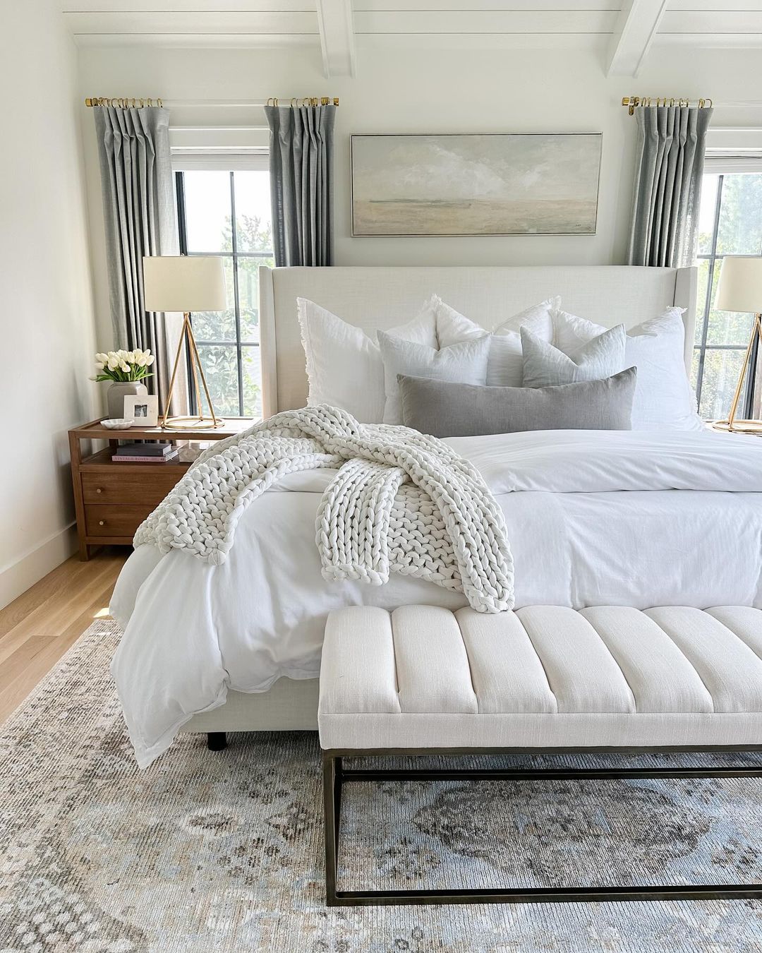 A tastefully designed bedroom with natural light