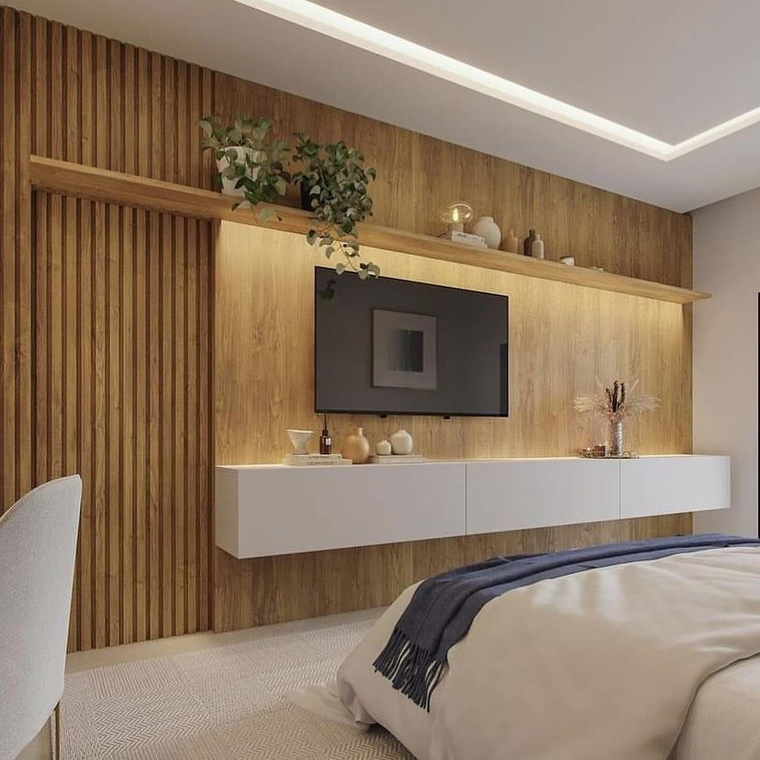 A modern and stylish bedroom with integrated lighting