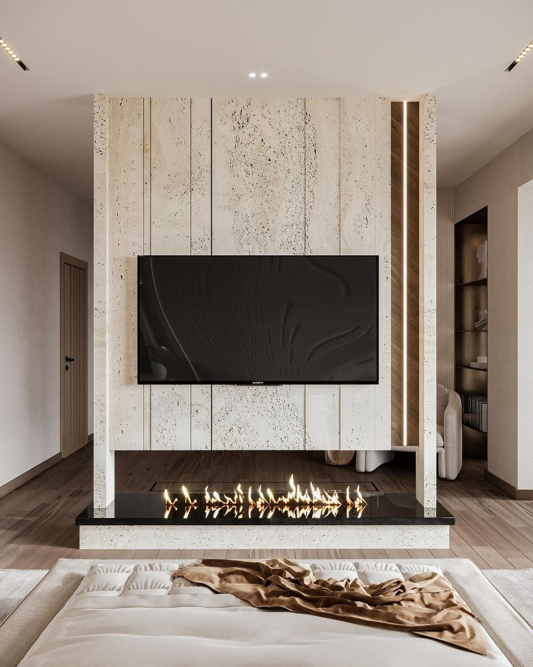 A modern bedroom with a seamless integration of a fireplace and entertainment center