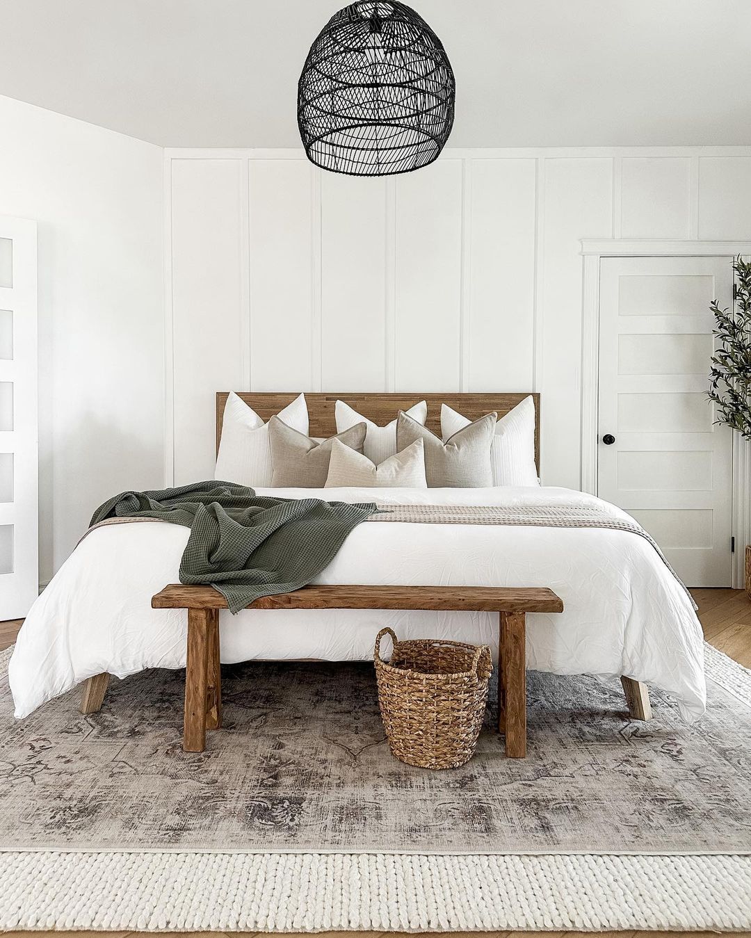 Serene and simplistic bedroom design with a harmonious blend of textures