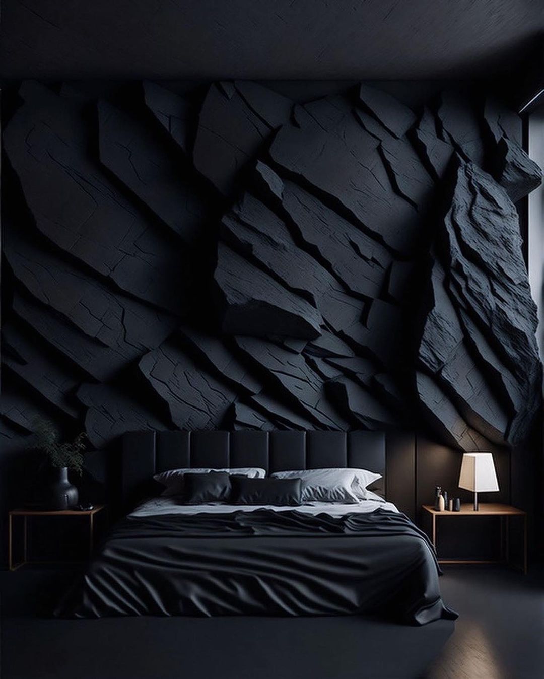 A dramatic modern bedroom featuring a textured dark wall that resembles slate.