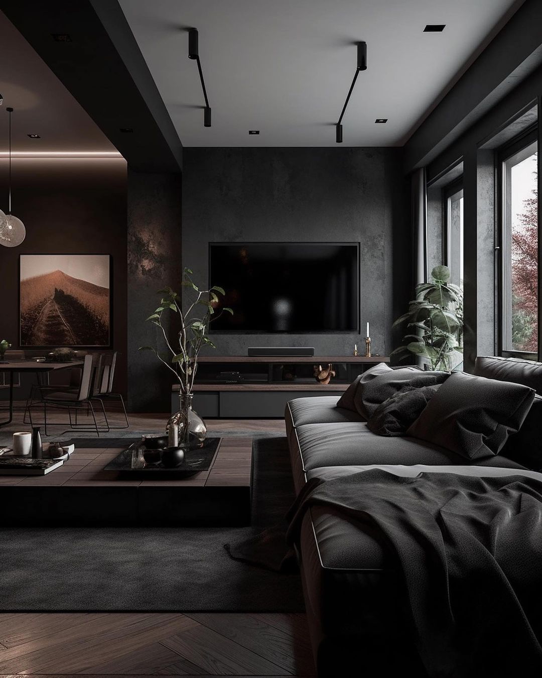 A modern dark-themed living room with ample natural light