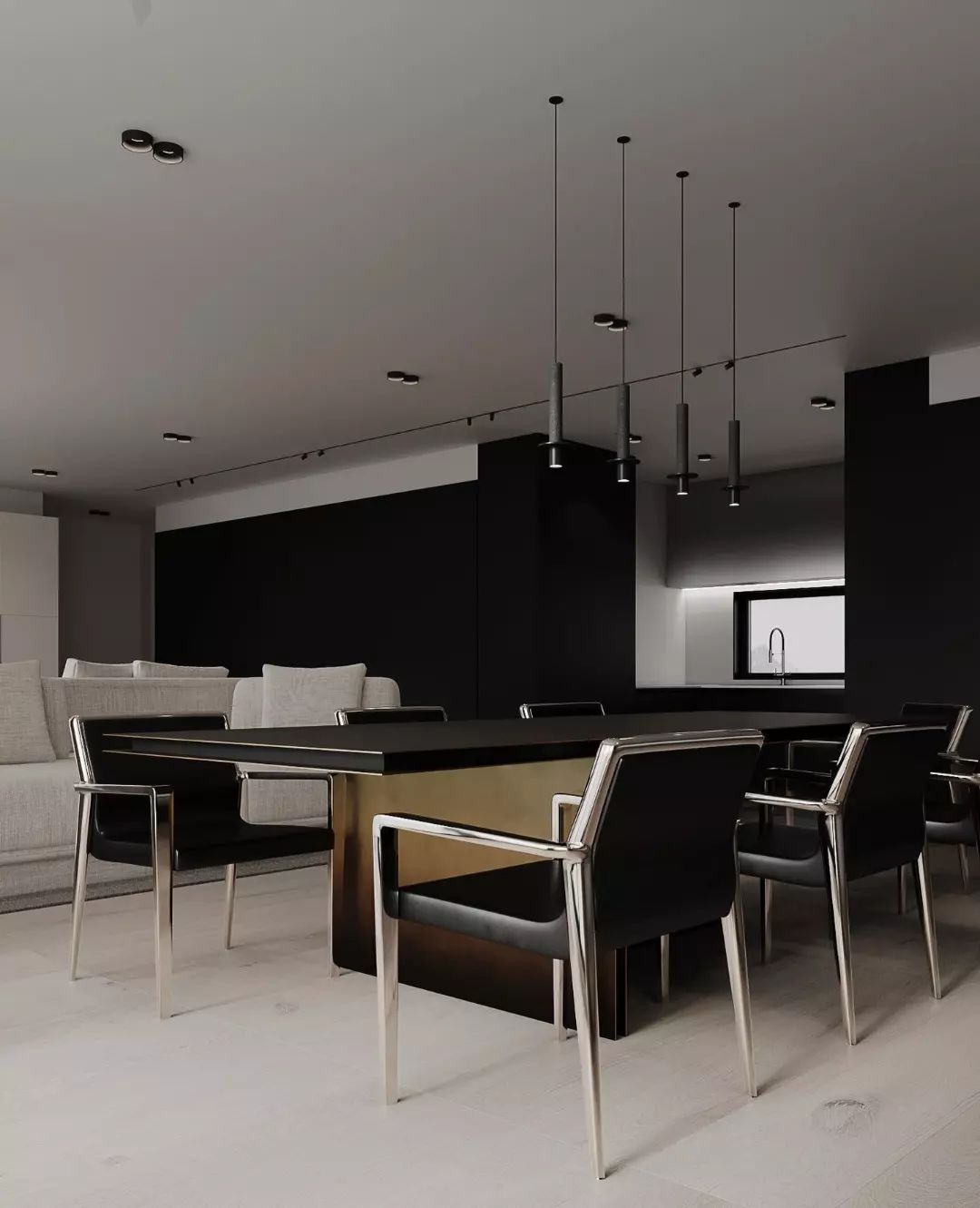 Modern minimalist dining room with contrasting black and gold table and metal-framed chairs