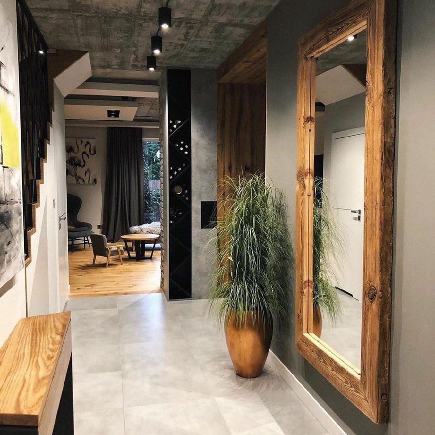 A modern hallway blending rustic and contemporary elements