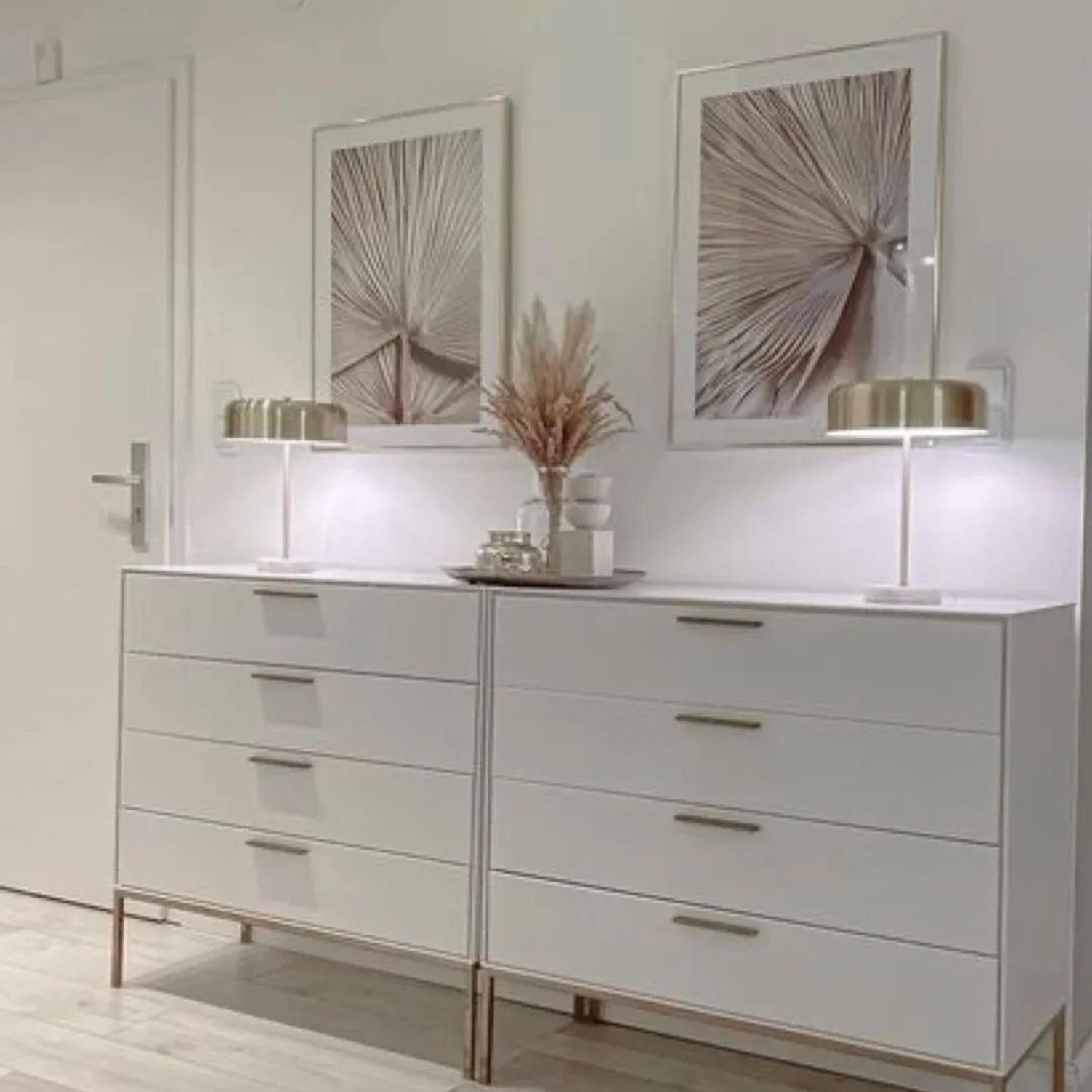 Elegant white dresser with accent decor