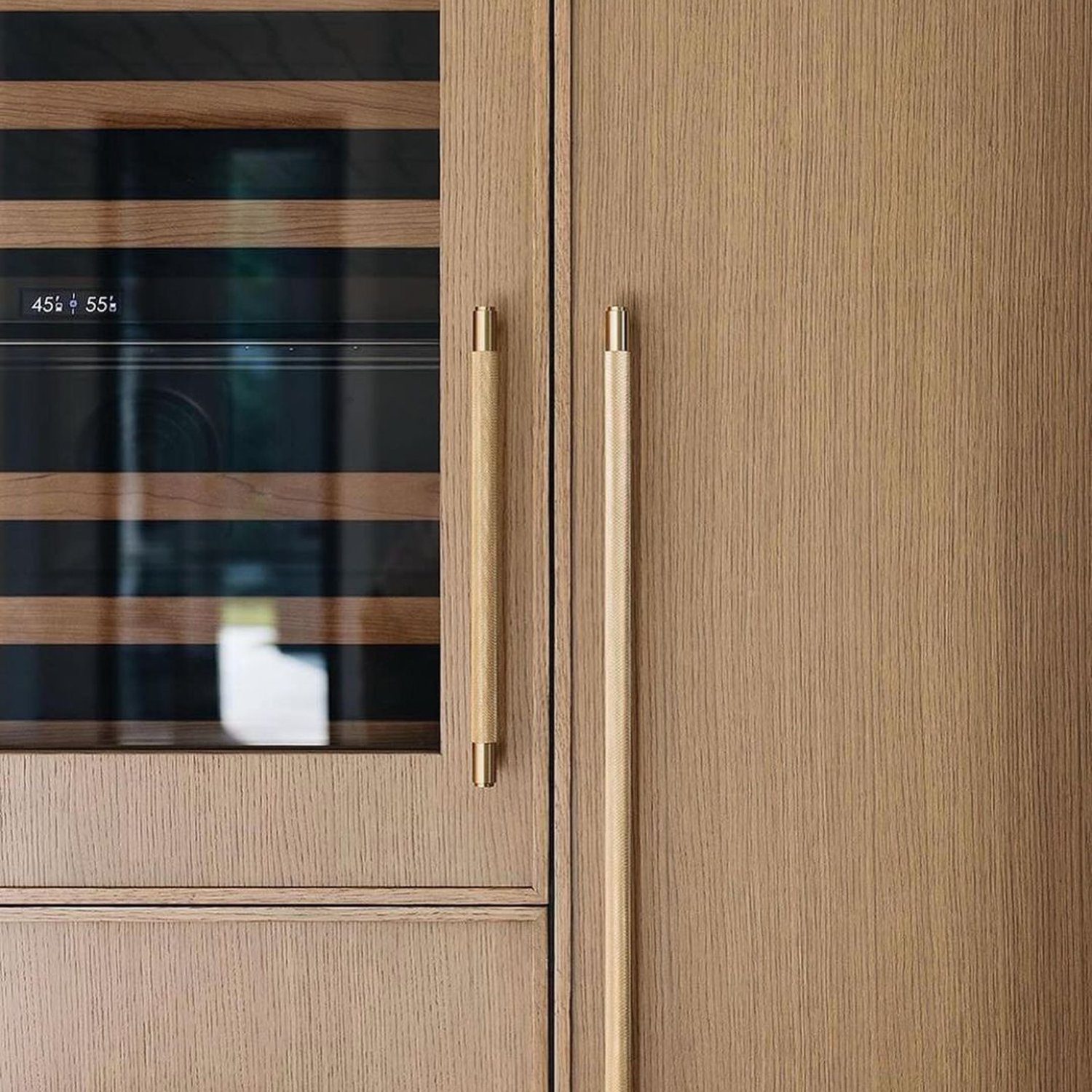 Elegant wooden cabinetry with sleek brass handles