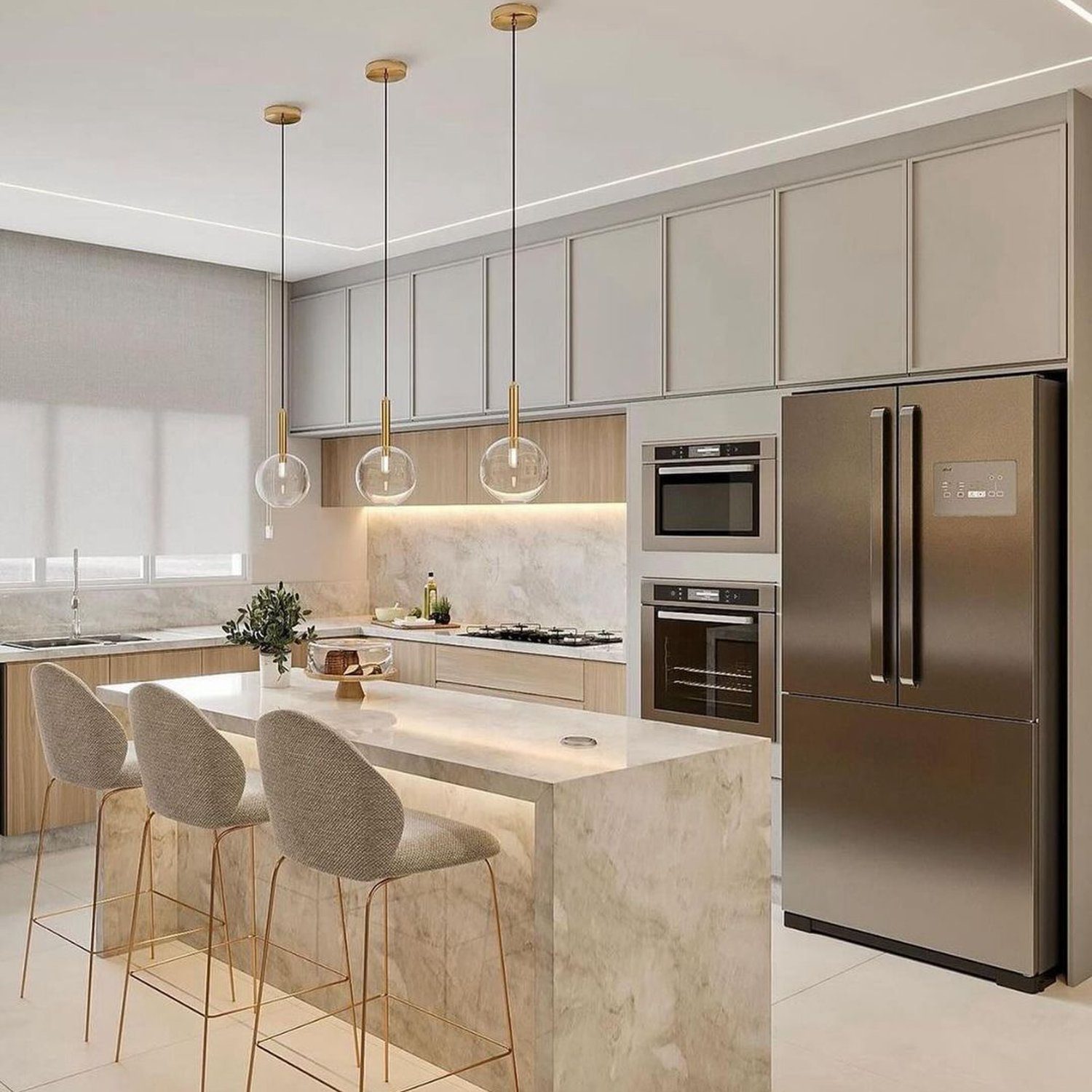 Modern spacious kitchen with sleek design and marble accents