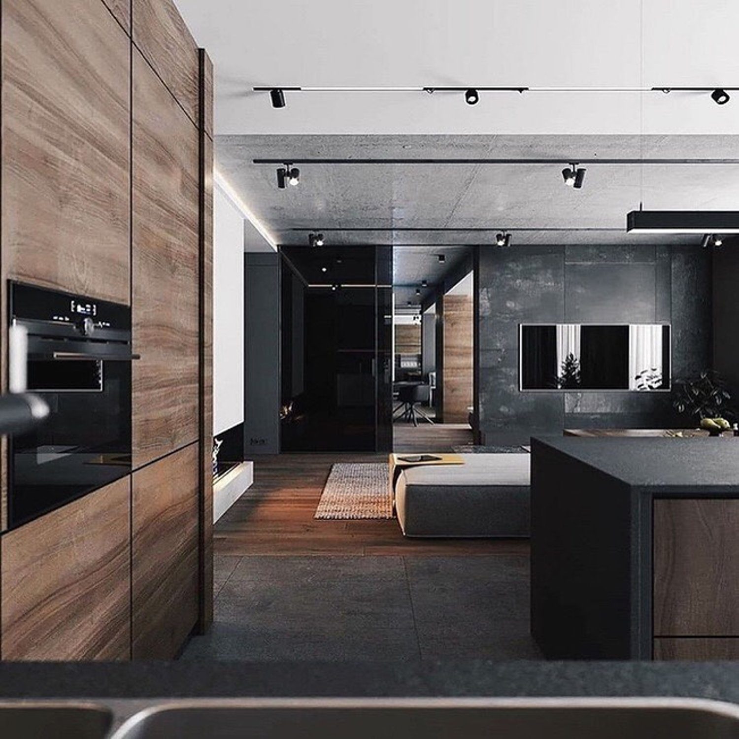 A sleek and modern kitchen design featuring a combination of wood textures and gray tones, complemented by ambient lighting.