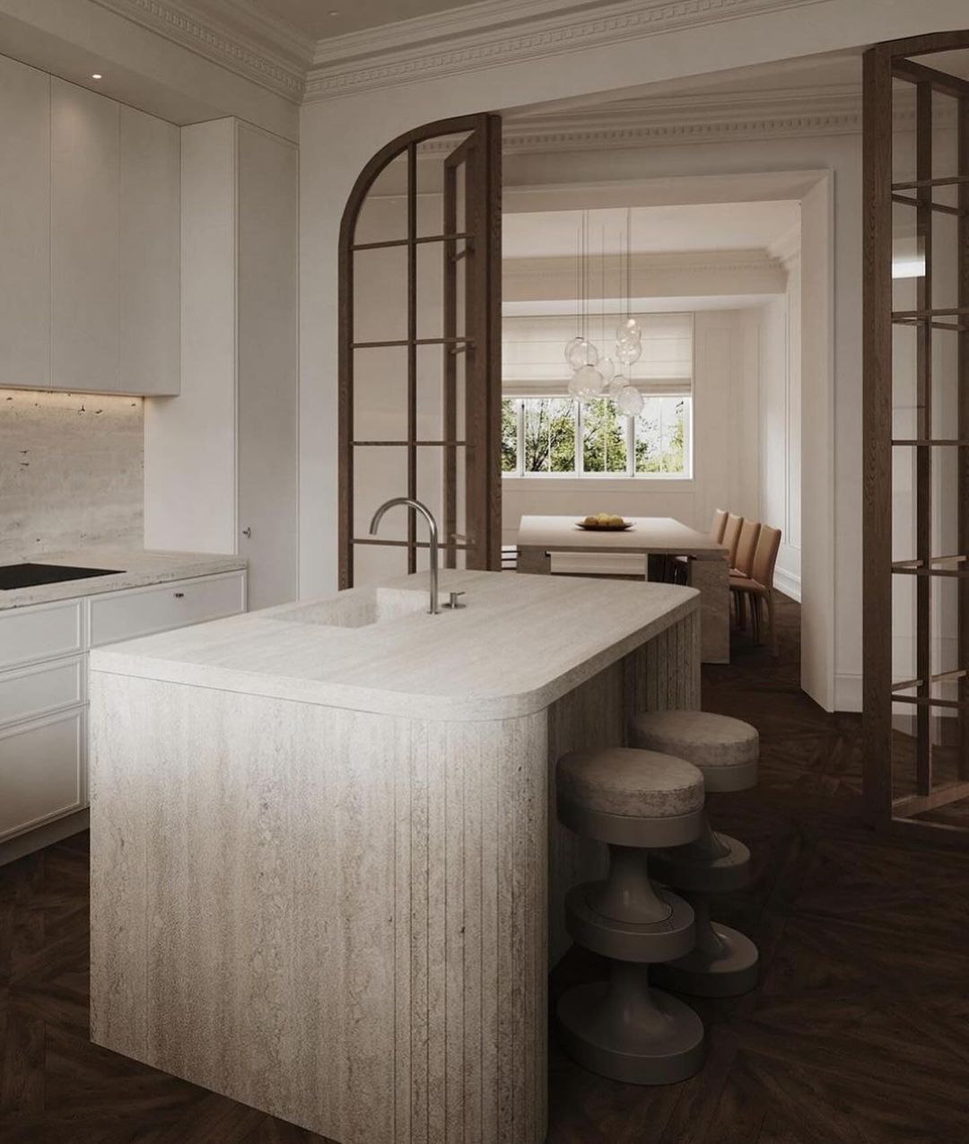 A sophisticated and serene kitchen space with an emphasis on natural textures and muted tones